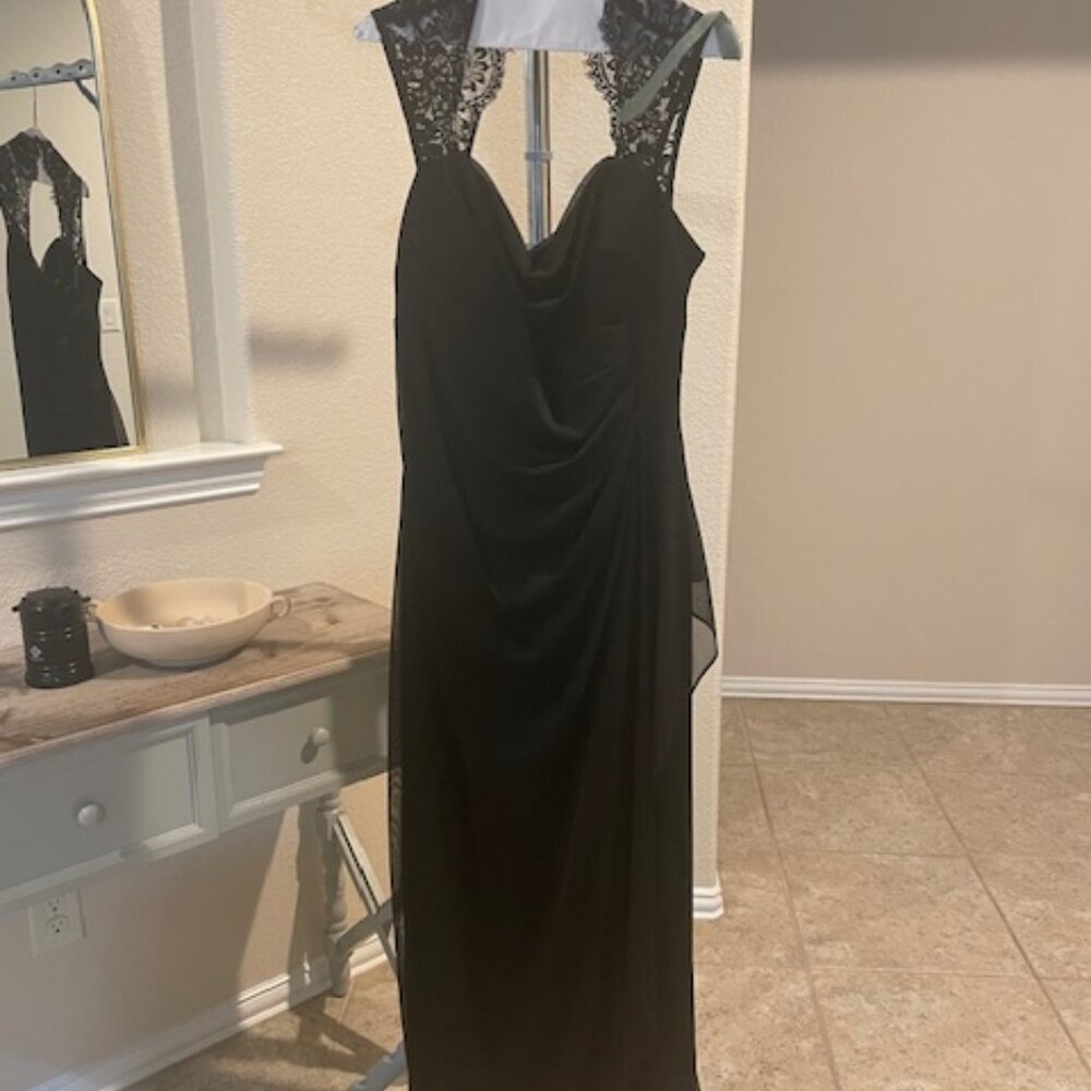 Evening black dress with lace shoulders and back.